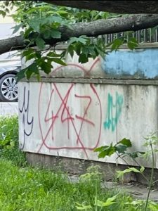 Graffiti of 447 with an X through it in Poland