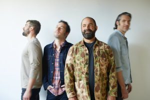 The four members of Drew Holcomb and the Neighbors